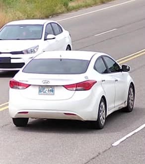 Witnesses and security footage caught the suspect robbing the Harrah FNB Community Bank. The suspect is described as a 6-foot tall black man wearing a blue hoody, black balaclava and blue jeans. He was seen driving a 2012 Hyundai. (PHOTOS PROVIDED)