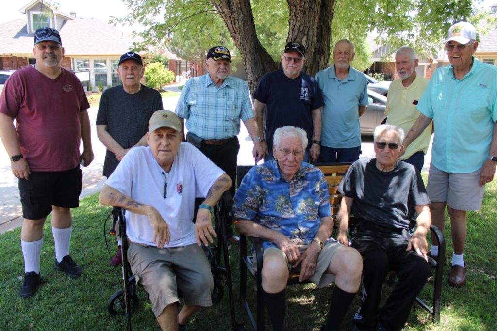 Laurel Springs Veterans are pictured by the Veterans Wall inside the Active Adult Community. (Photo y Jacob Sturm)