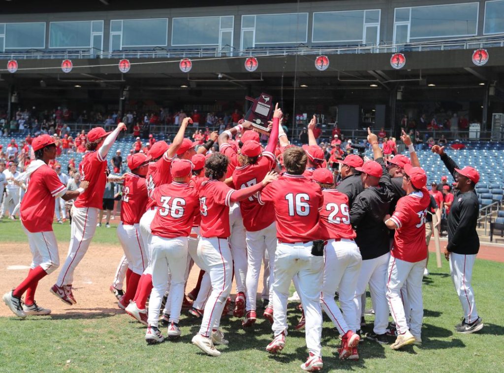 Carl Albert baseball players and coaches celebrate after winning the Class 5A state championship Saturday at ONE OK Field in Tulsa. Photo by Ron Lane